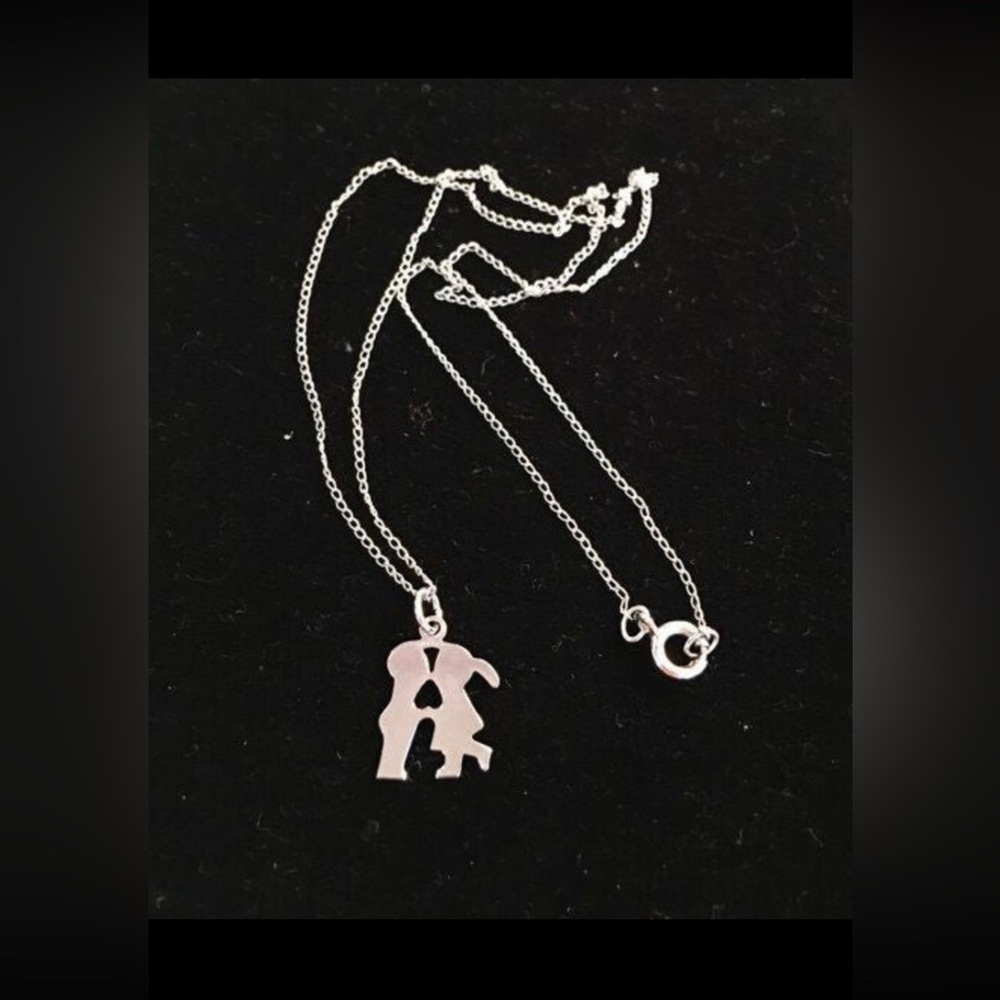 Vintage sterling children kiss necklace